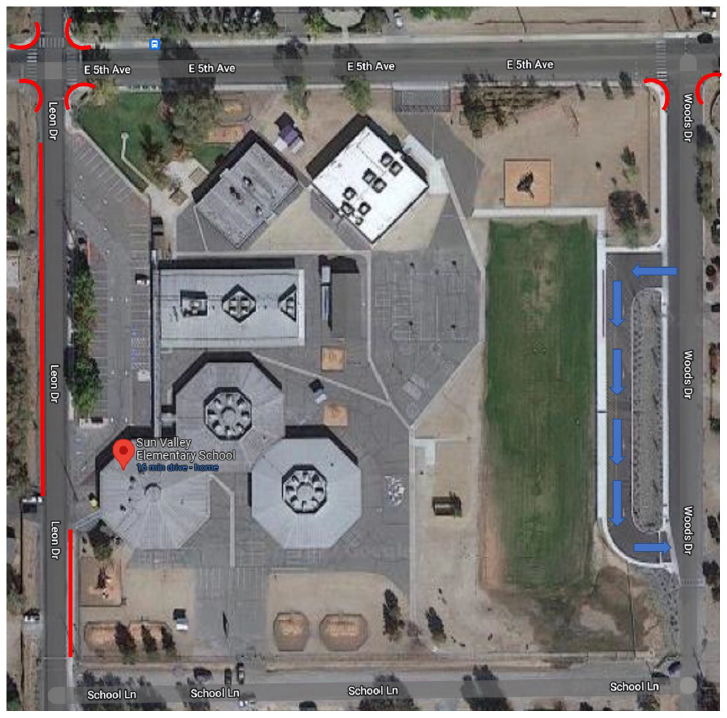 Image indicates that vehicles should only enter the school parking lot via the south entrance and exit out the north entrance. Traffic patter is only one direction.